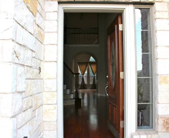 a picture of a bathroom with a shower