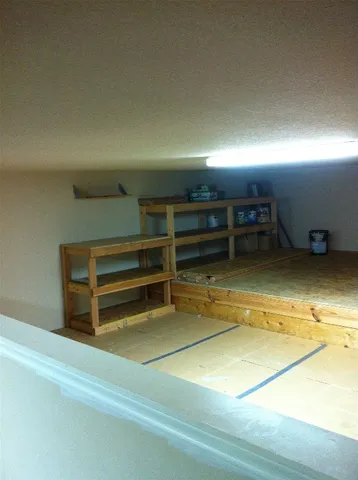 a picture of a room with a white wall and white walls