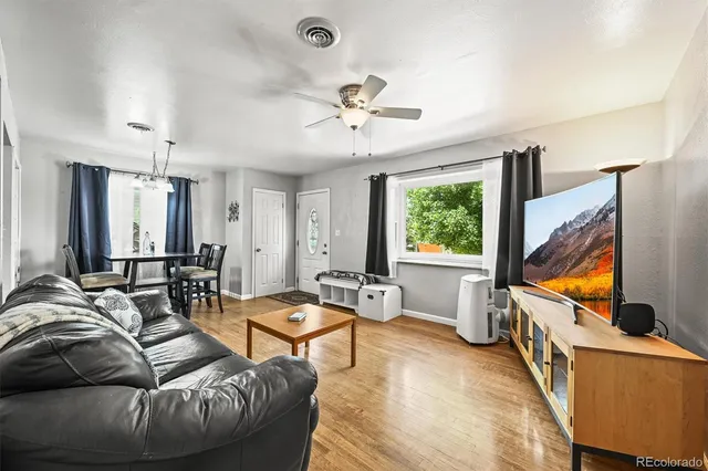 a kitchen with granite countertop a sink and a window