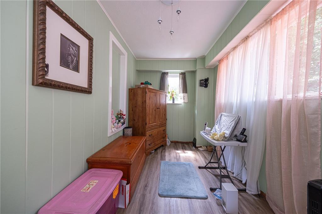 15 Old Soose Road, Unit A Pittsburgh, PA 15209 - Photo 11 of 27 a room with furniture and wooden floor