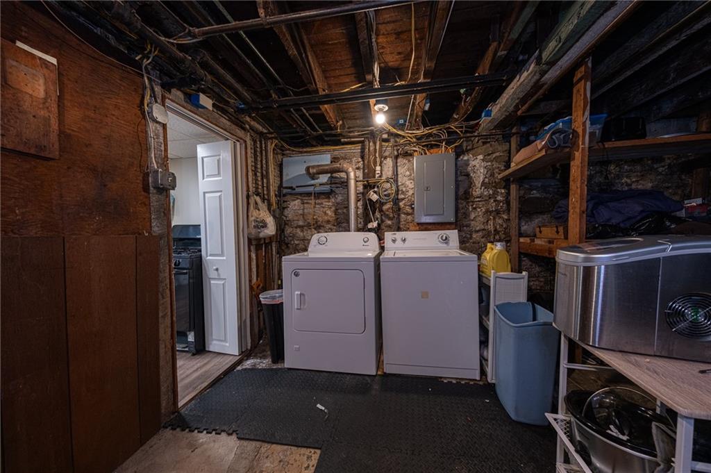 15 Old Soose Road, Unit A Pittsburgh, PA 15209 - Photo 22 of 27 a view of a storage room with washer and dryer