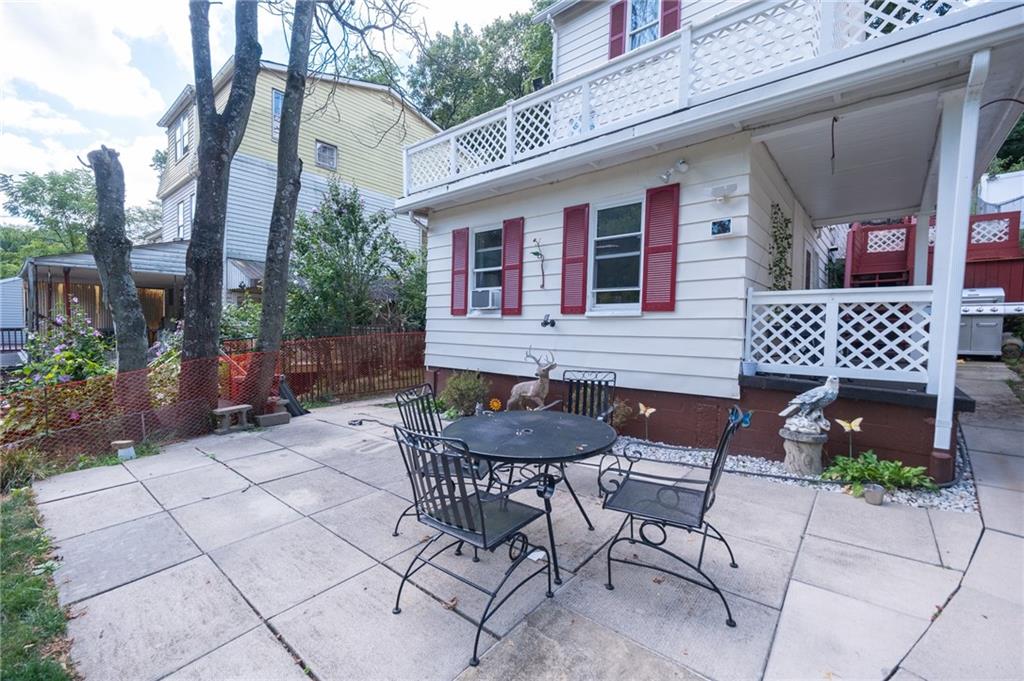 15 Old Soose Road, Unit A Pittsburgh, PA 15209 - Photo 24 of 27 a view of a patio with table and chairs and potted plants