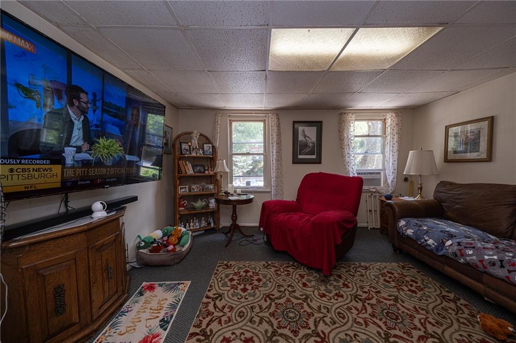 15 Old Soose Road, Unit A Pittsburgh, PA 15209 - Photo 9 of 27 a living room with furniture and wooden floor