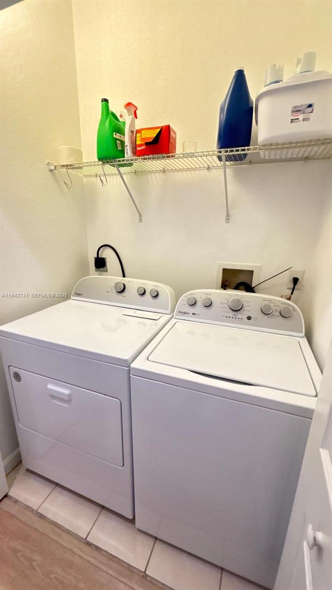 25380 Southwest 115th Court Homestead, FL 33032 - Photo 22 of 32 a utility room with dryer and washer