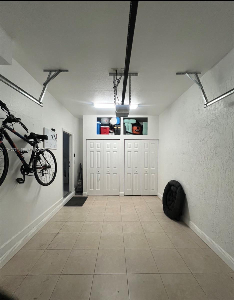 25380 Southwest 115th Court Homestead, FL 33032 - Photo 23 of 32 a view of a storage & utility room with closet