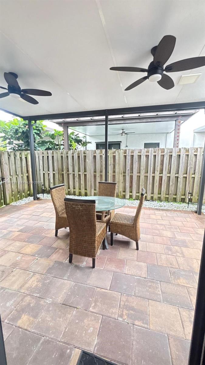 25380 Southwest 115th Court Homestead, FL 33032 - Photo 25 of 32 a view of outdoor space with seating area