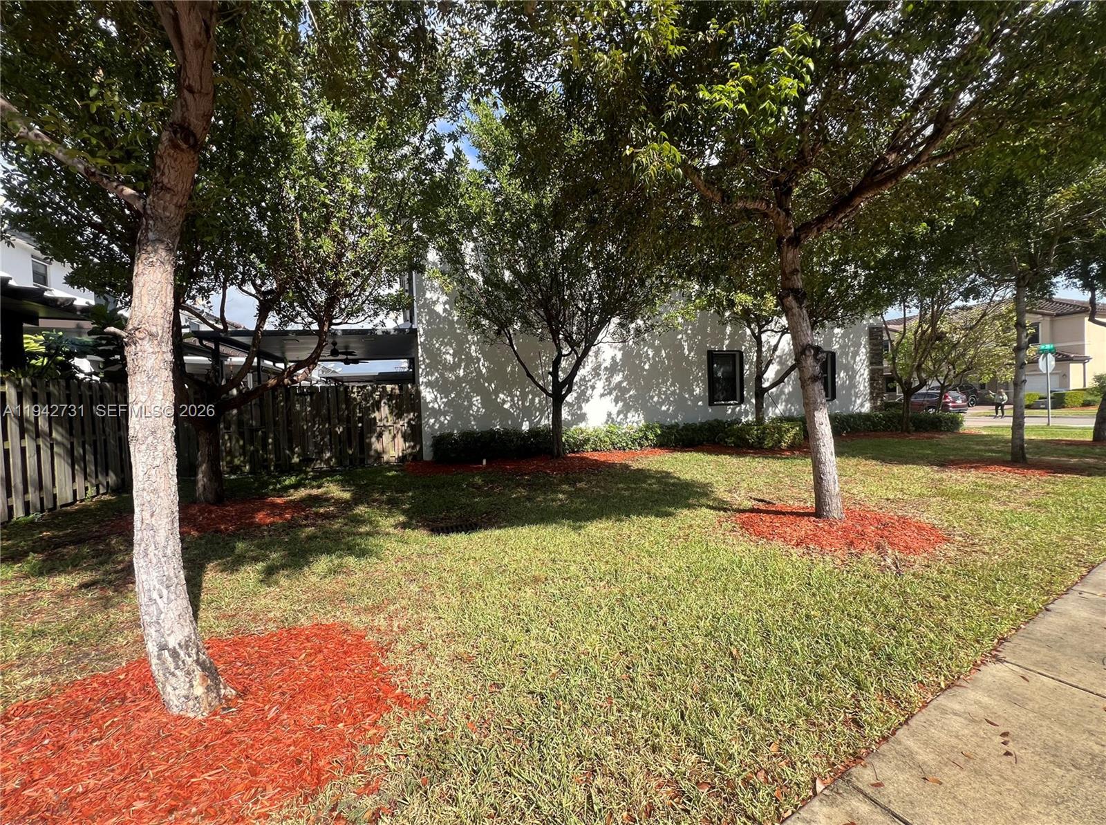 25380 Southwest 115th Court Homestead, FL 33032 - Photo 28 of 32 a view of yard with tree