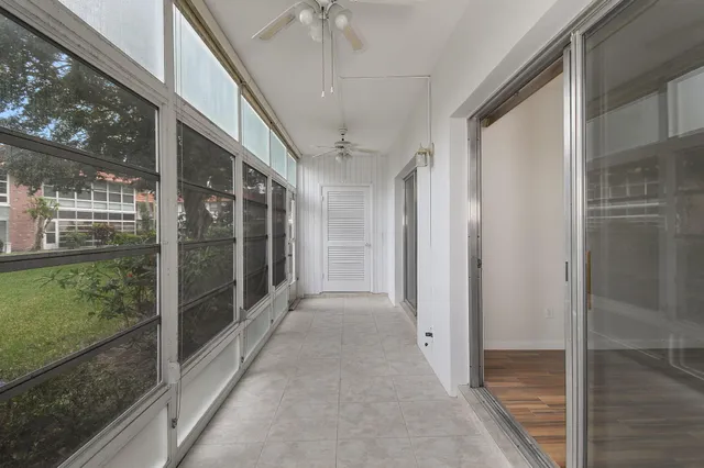 a view of a living room and window