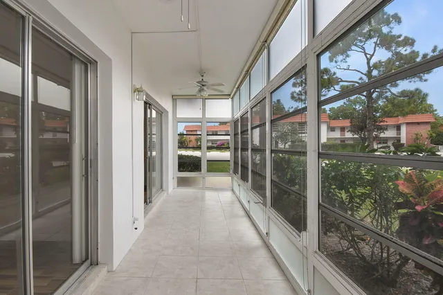 a view of outdoor space with green field and trees