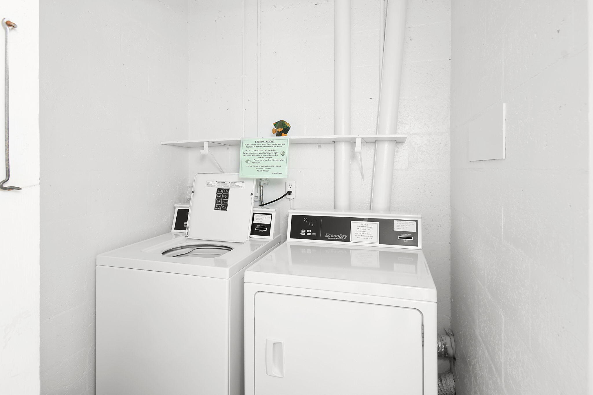 2600 Southeast Ocean Boulevard, Unit S7 Stuart, FL 34996 - Photo 22 of 38 a utility room with dryer and washer