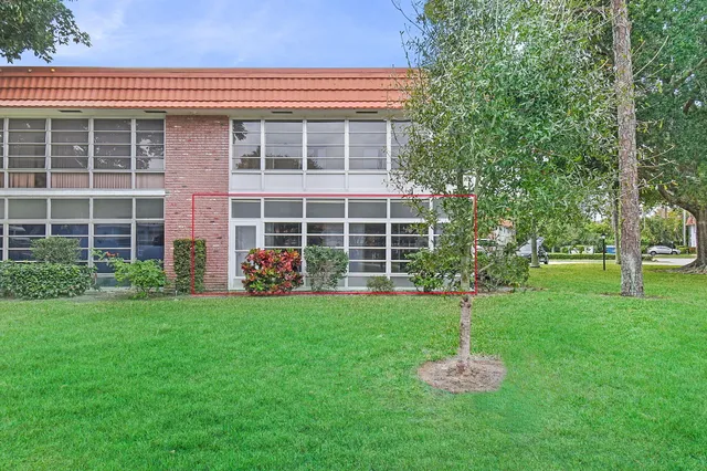 a view of swimming pool with outdoor seating and deck