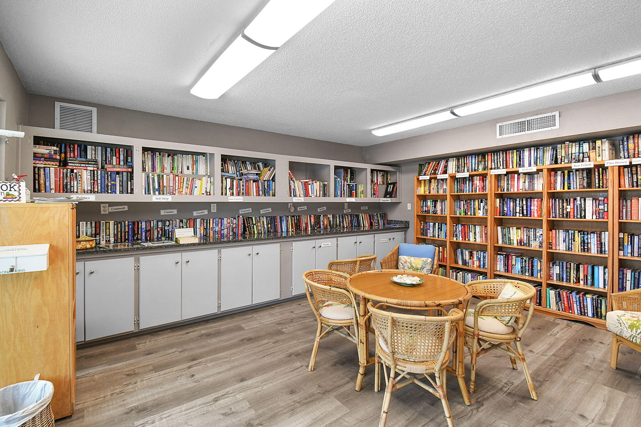 2600 Southeast Ocean Boulevard, Unit S7 Stuart, FL 34996 - Photo 33 of 38 a living room with furniture and a book shelf