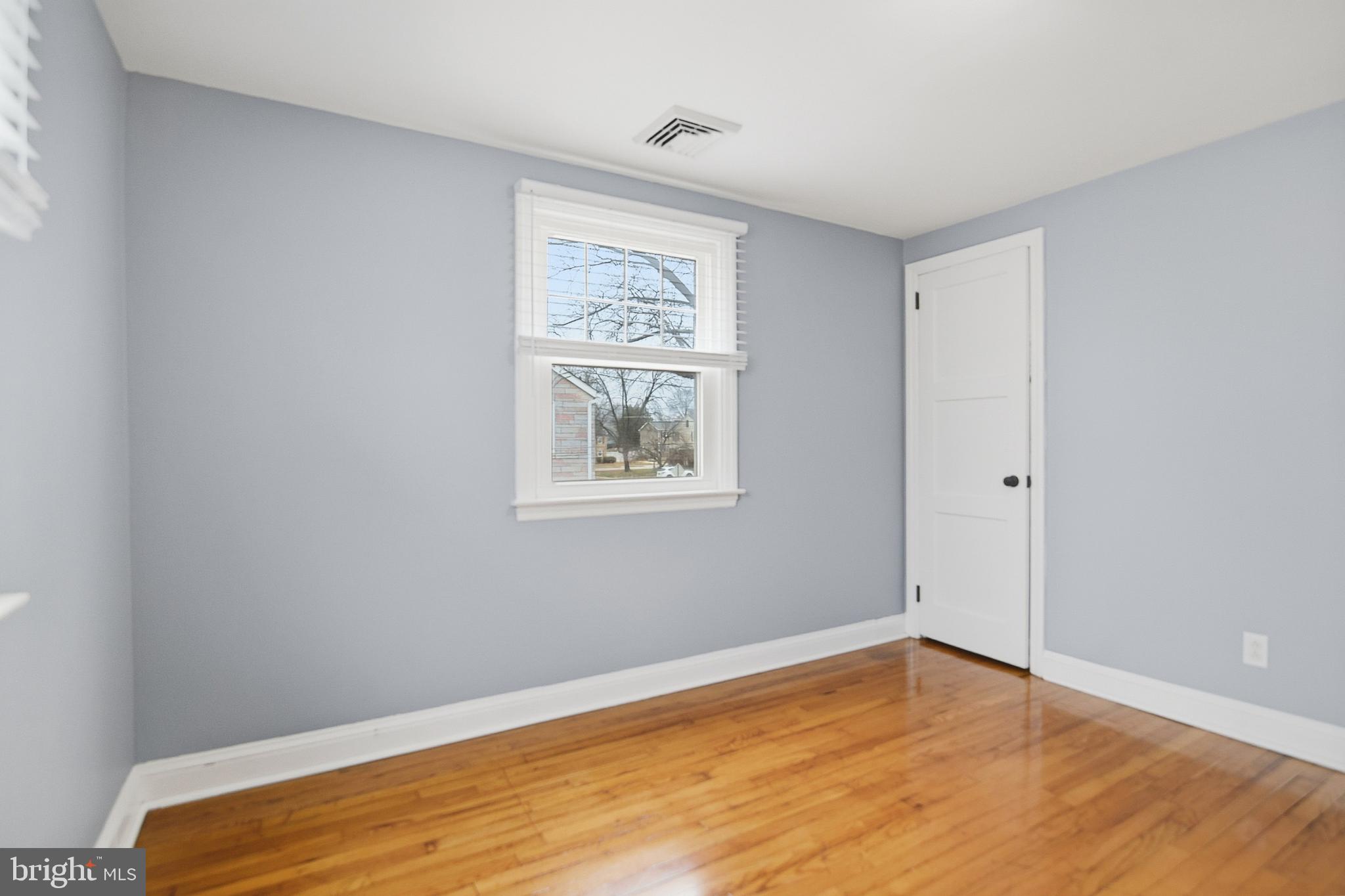 40 Lee Street, Unit B Woodstown, NJ 08098 - Photo 11 of 21 a view of room with window and wooden floor