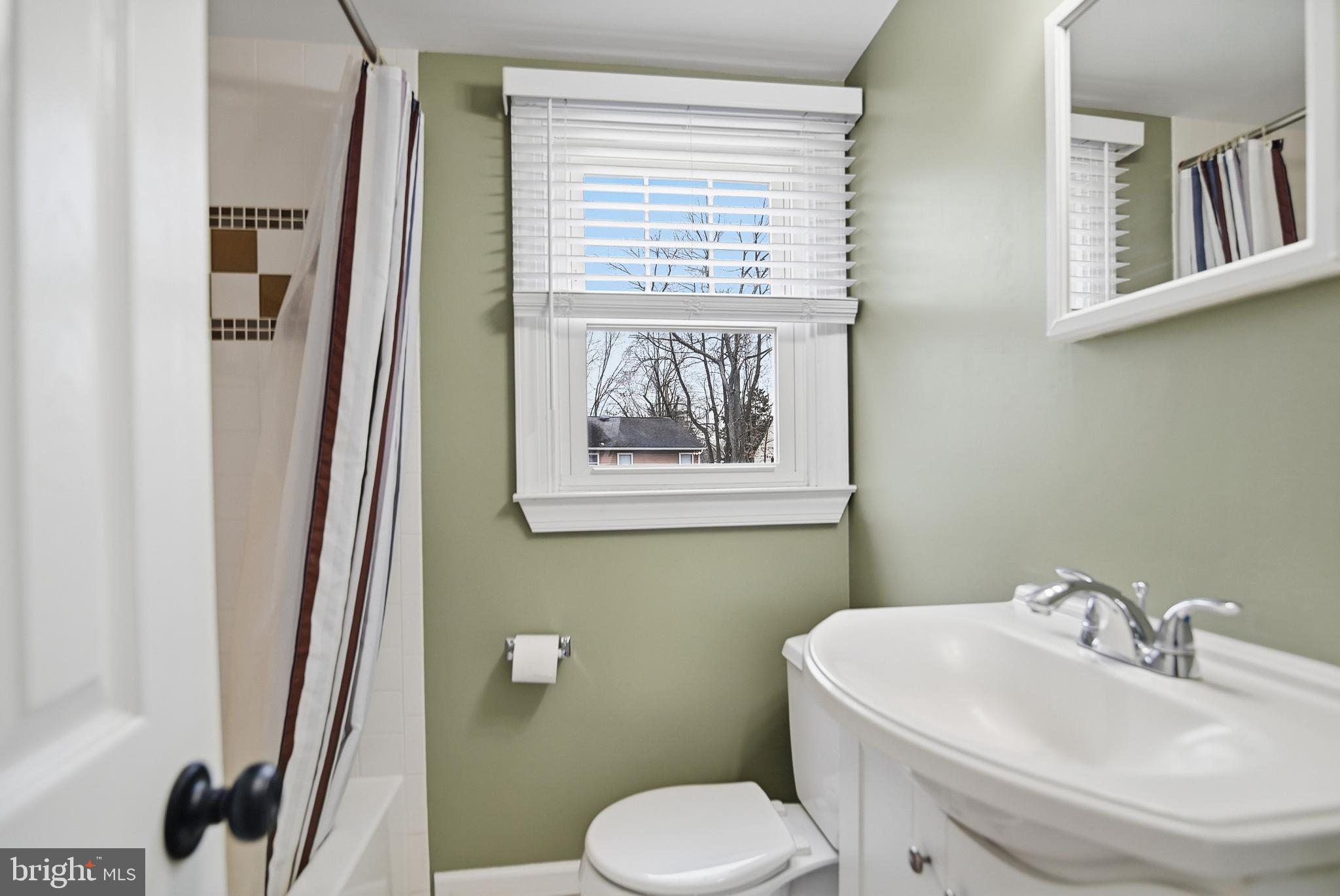 40 Lee Street, Unit B Woodstown, NJ 08098 - Photo 14 of 21 a bathroom with a toilet and a sink