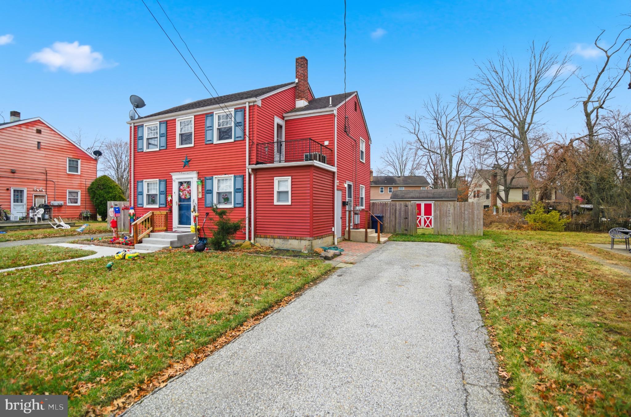 40 Lee Street, Unit B Woodstown, NJ 08098 - Photo 16 of 21 a front view of a house with a yard