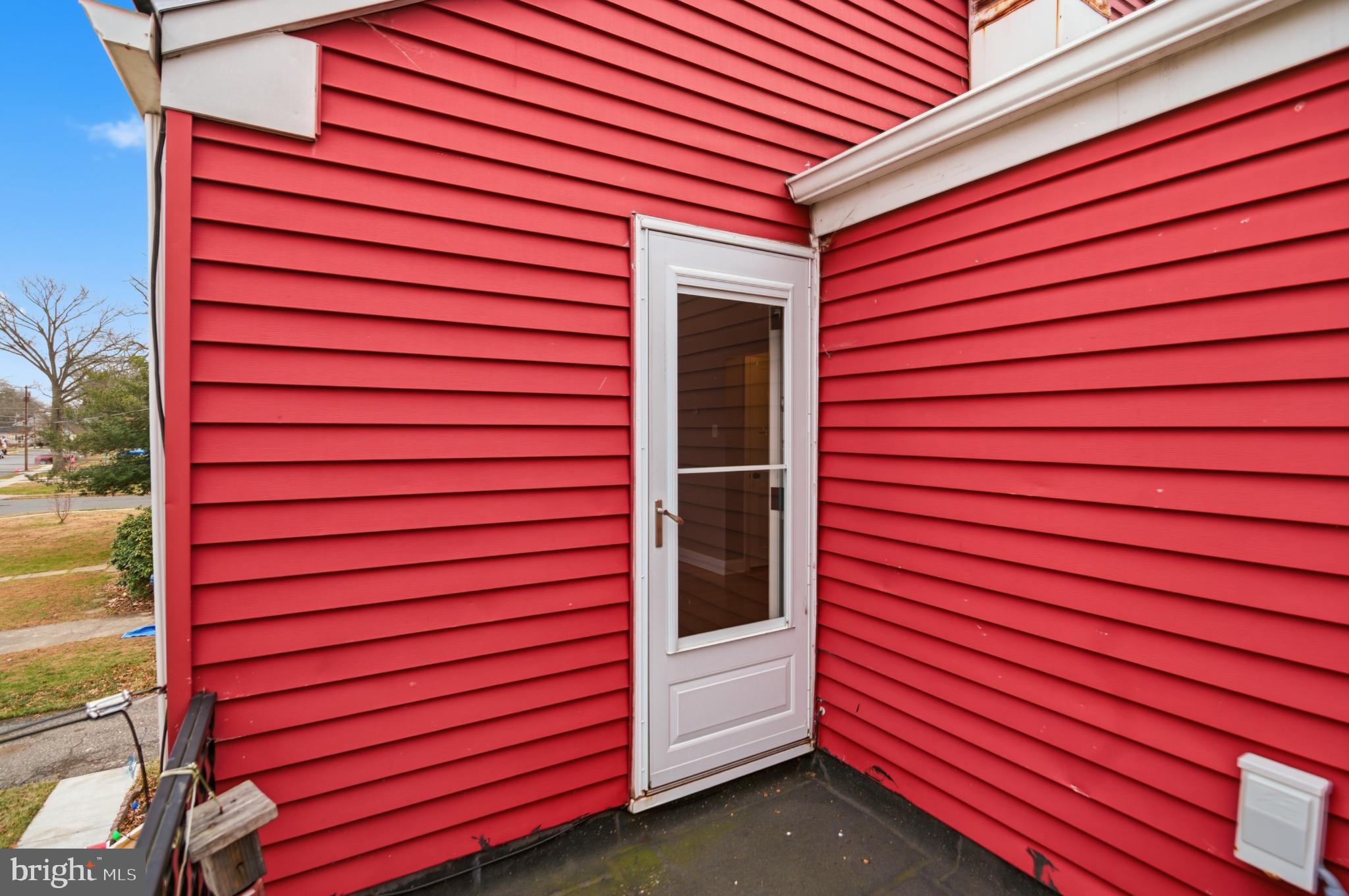 40 Lee Street, Unit B Woodstown, NJ 08098 - Photo 18 of 21 a view of a brick wall with a large window