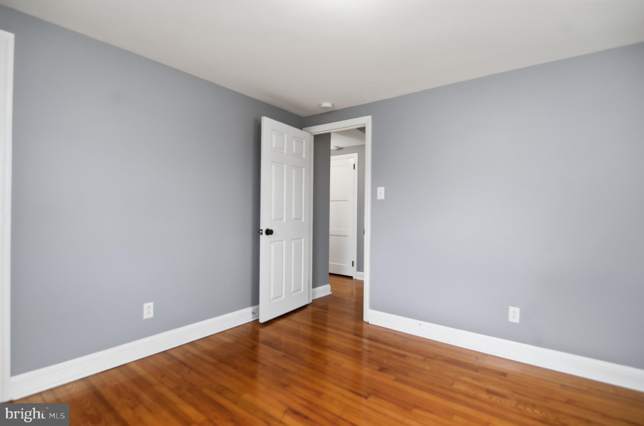 40 Lee Street, Unit B Woodstown, NJ 08098 - Photo 10 of 21 a view of an empty room with wooden floor