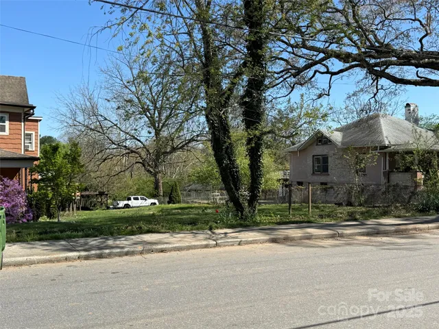 a view of a car parked on the side of the road