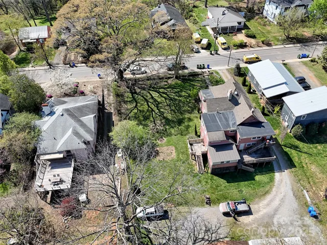 an aerial view of residential house with outdoor space