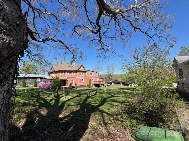 a view of a house with a street