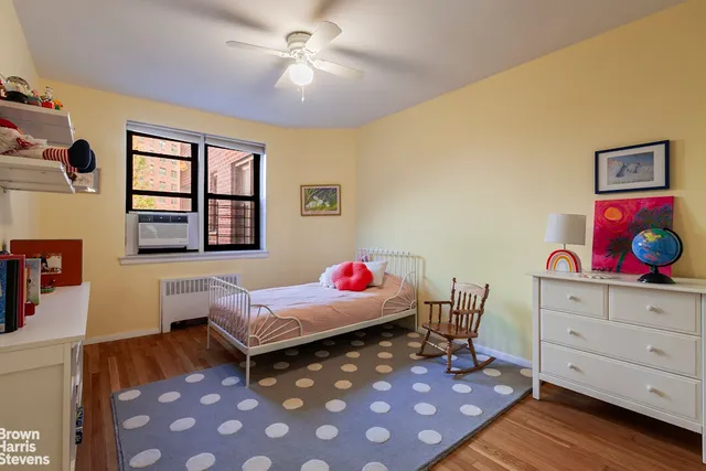 a bathroom with a sink shower and a mirror
