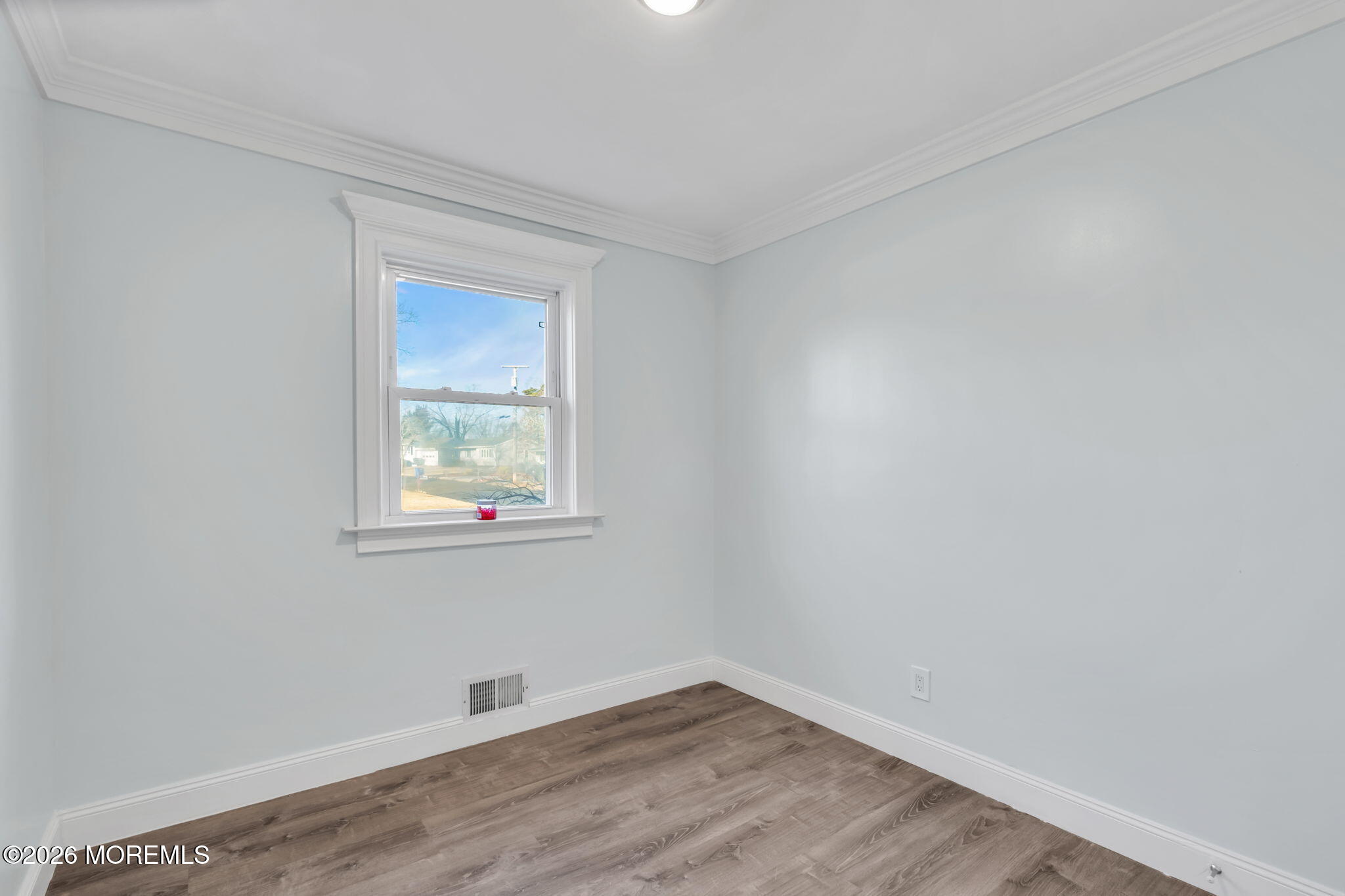 905 Harrison Road Toms River, NJ 08753 - Photo 11 of 41 wooden floor in an empty room with a window