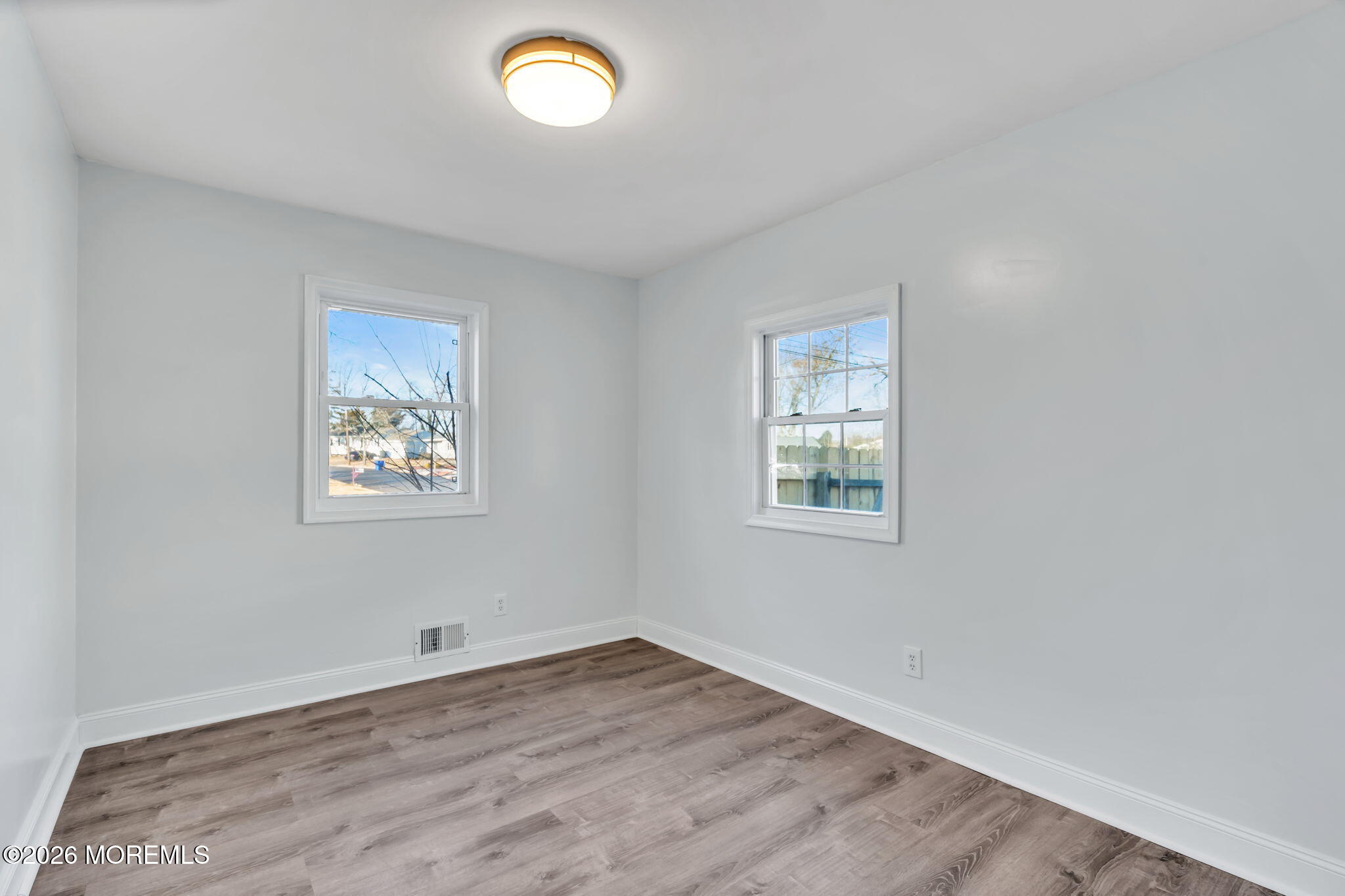 905 Harrison Road Toms River, NJ 08753 - Photo 13 of 41 an empty room with a window