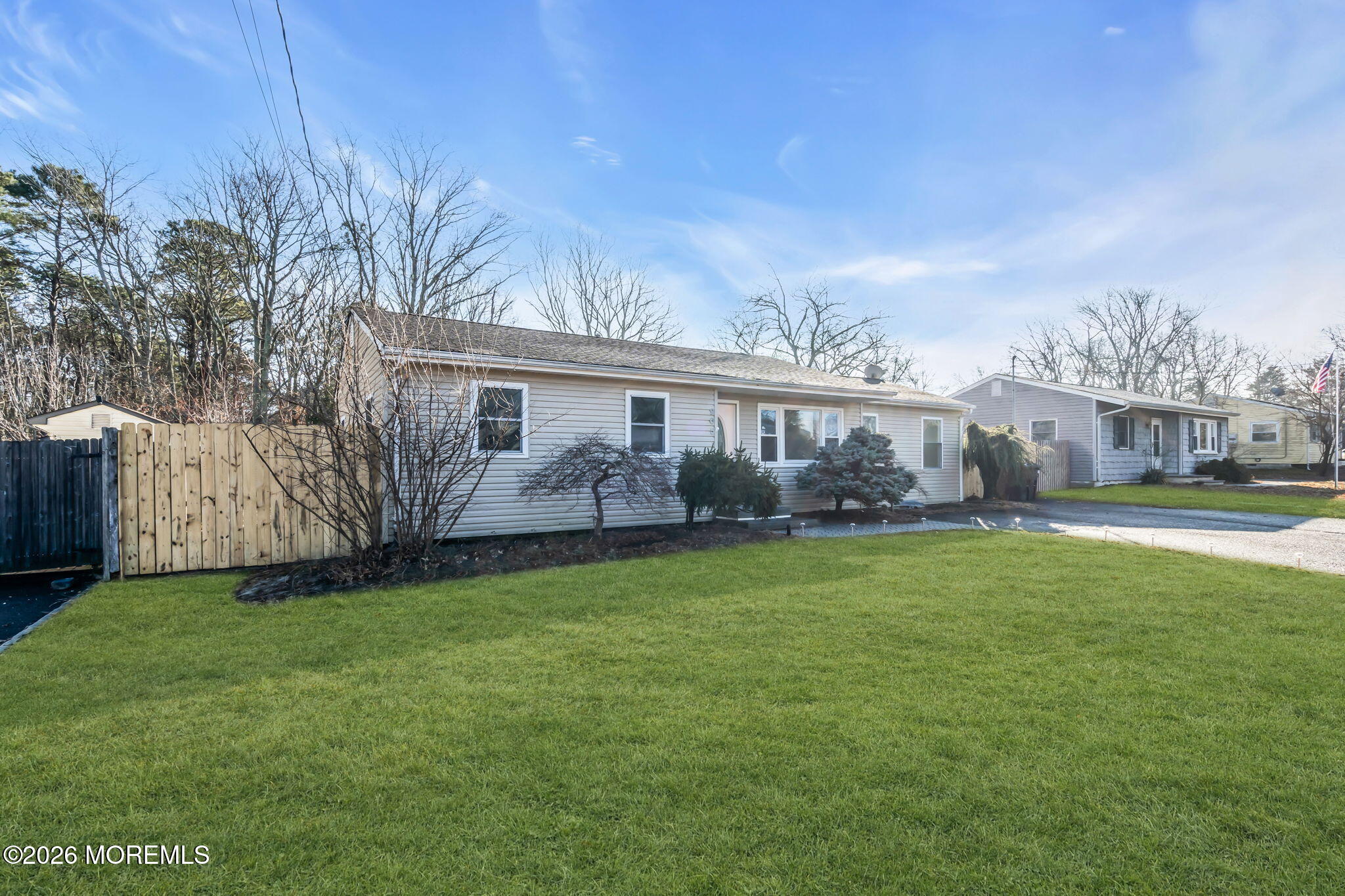 905 Harrison Road Toms River, NJ 08753 - Photo 25 of 41 a view of a house with a yard and sitting area