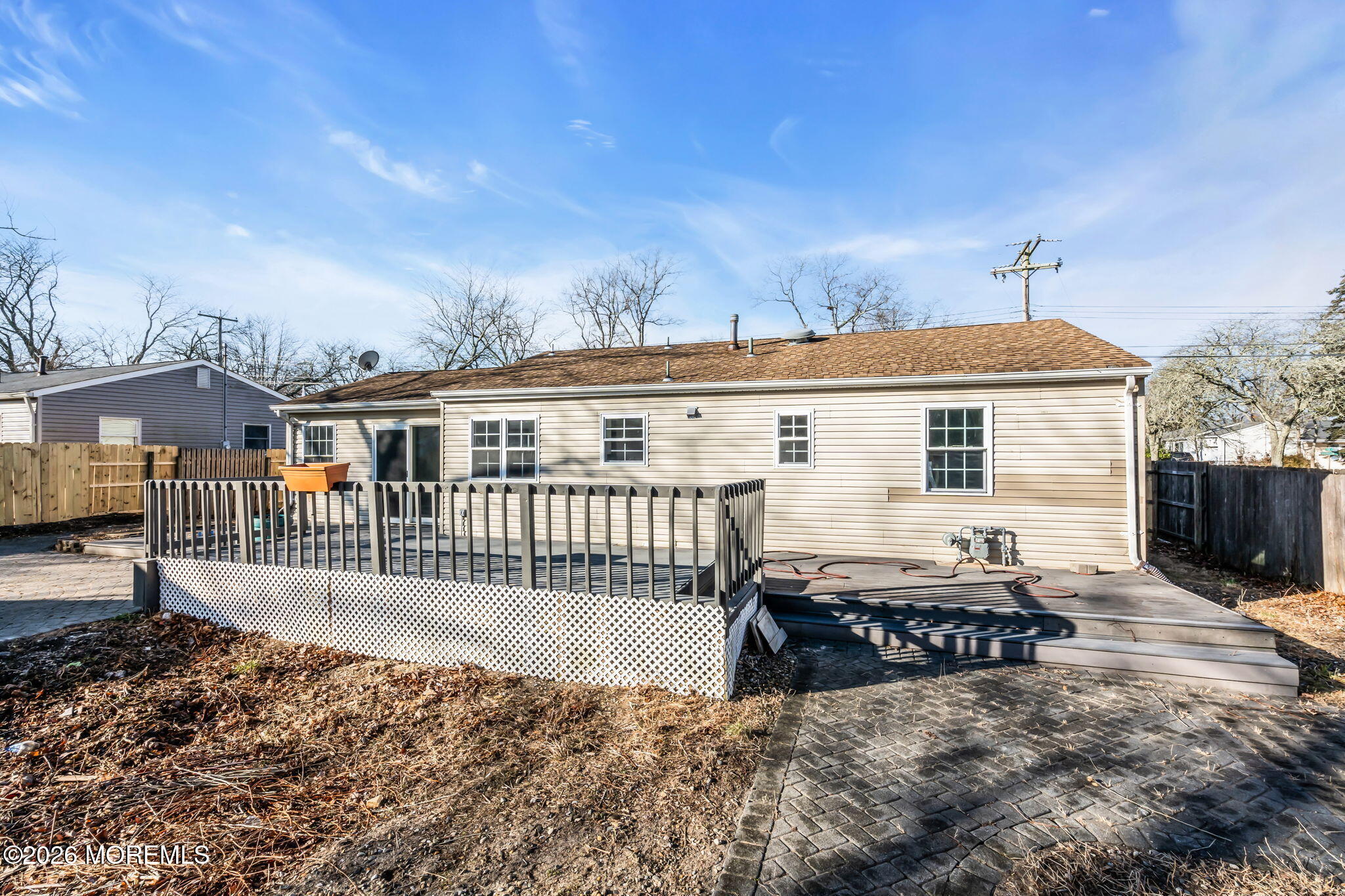 905 Harrison Road Toms River, NJ 08753 - Photo 31 of 41 a view of a house with a wooden deck