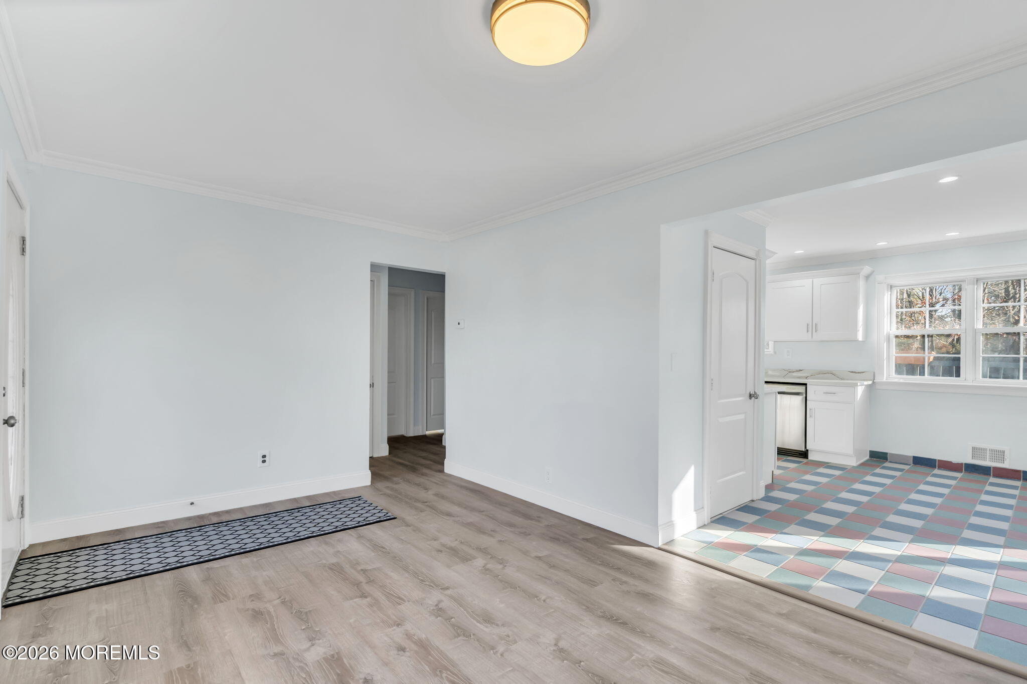 905 Harrison Road Toms River, NJ 08753 - Photo 33 of 41 a view of a room with wooden floor and a window