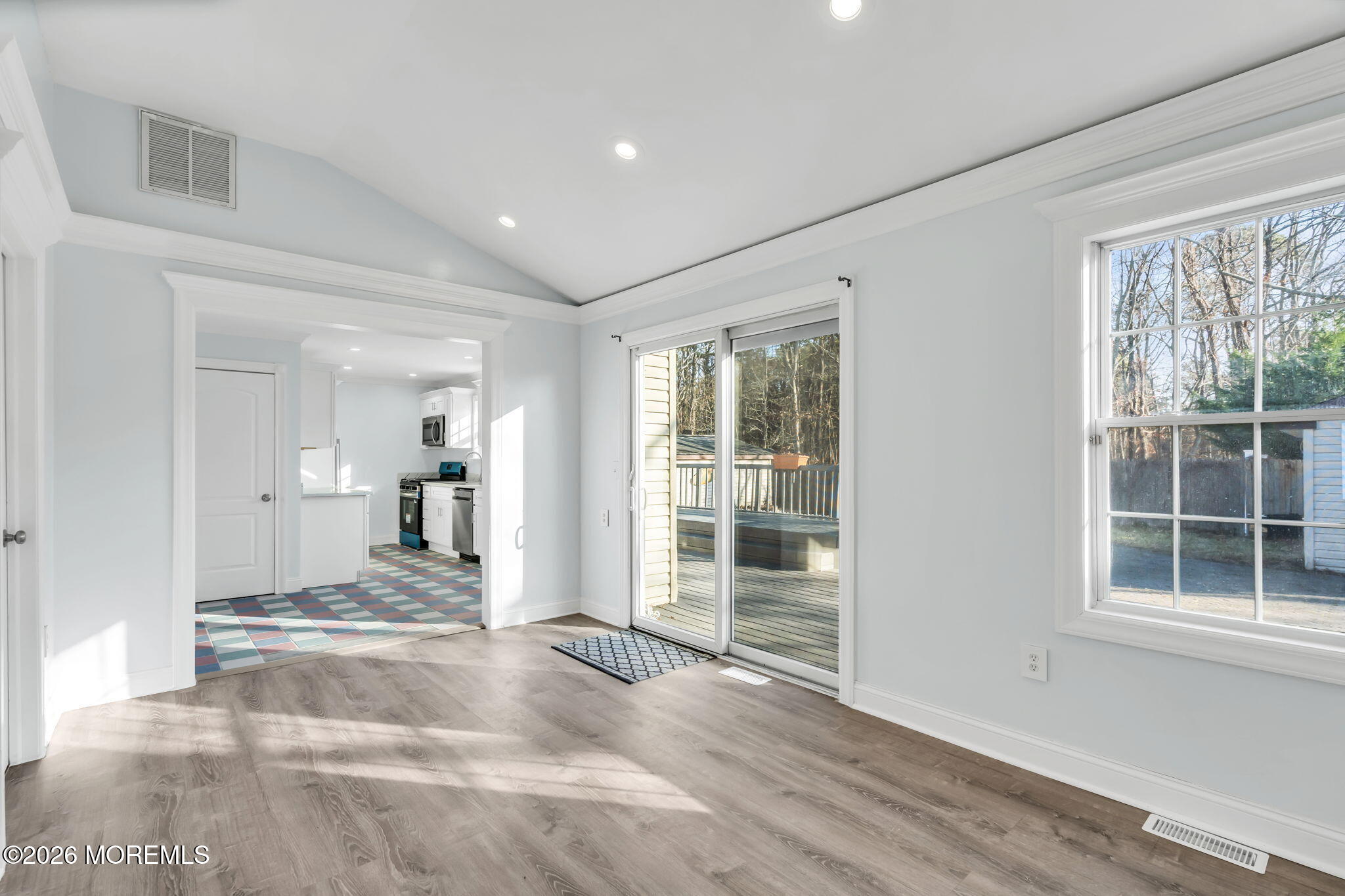 905 Harrison Road Toms River, NJ 08753 - Photo 35 of 41 a view of a room with wooden floor and windows