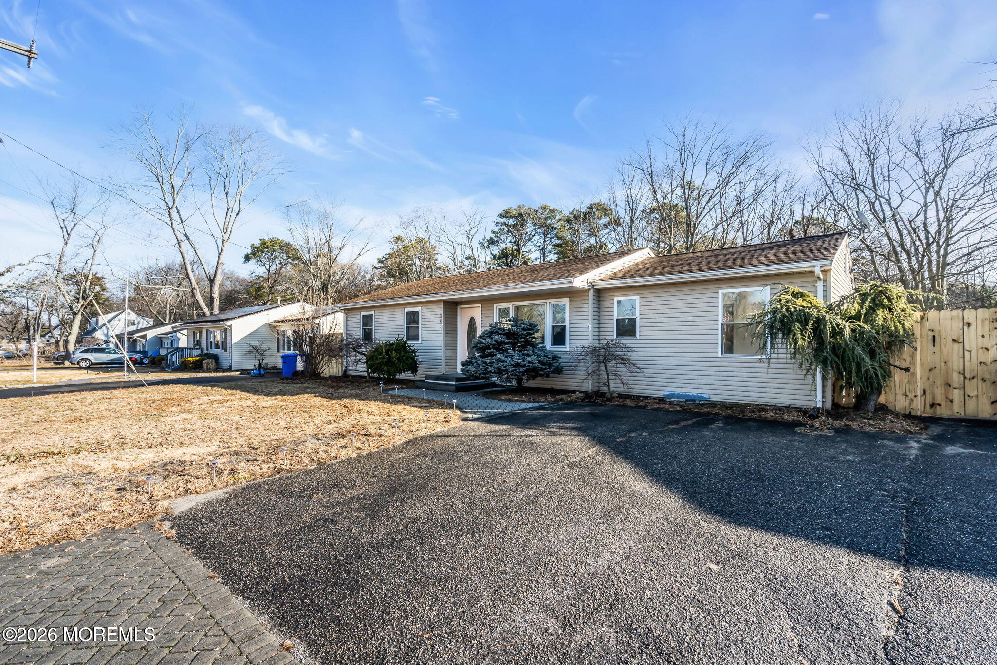 905 Harrison Road Toms River, NJ 08753 - Photo 41 of 41 a front view of house with yard and trees in the background