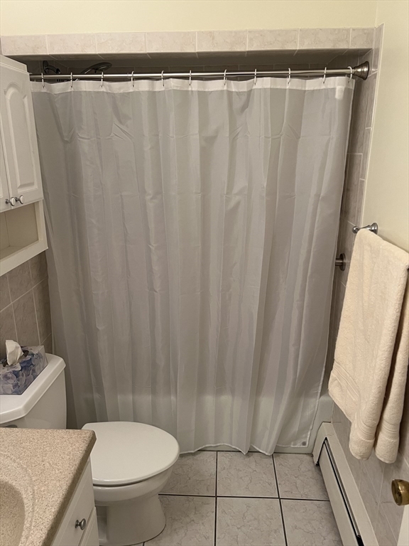 20 Colonial Drive, Unit 3 Andover, MA 01810 - Photo 20 of 24 a bathroom with a sink and toilet