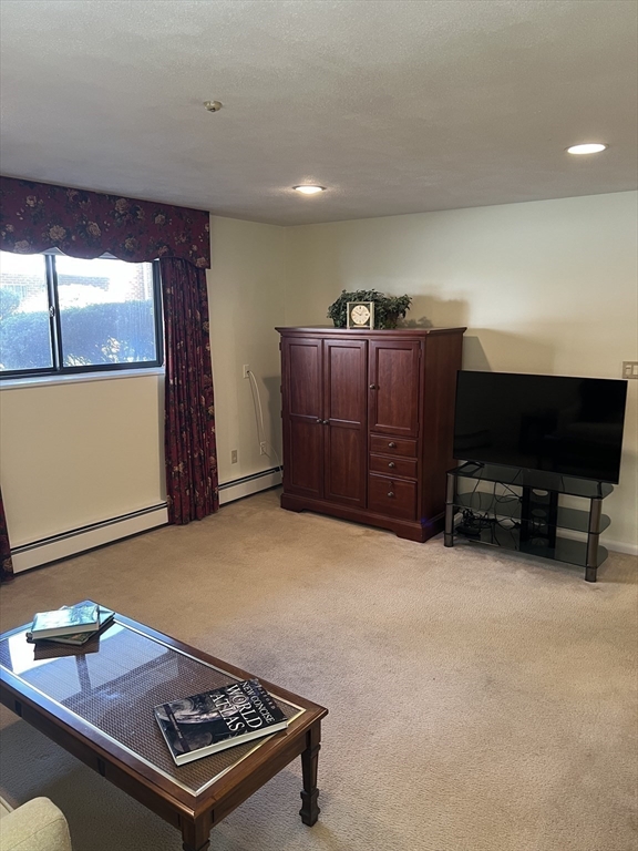 20 Colonial Drive, Unit 3 Andover, MA 01810 - Photo 10 of 24 a view of a livingroom with furniture