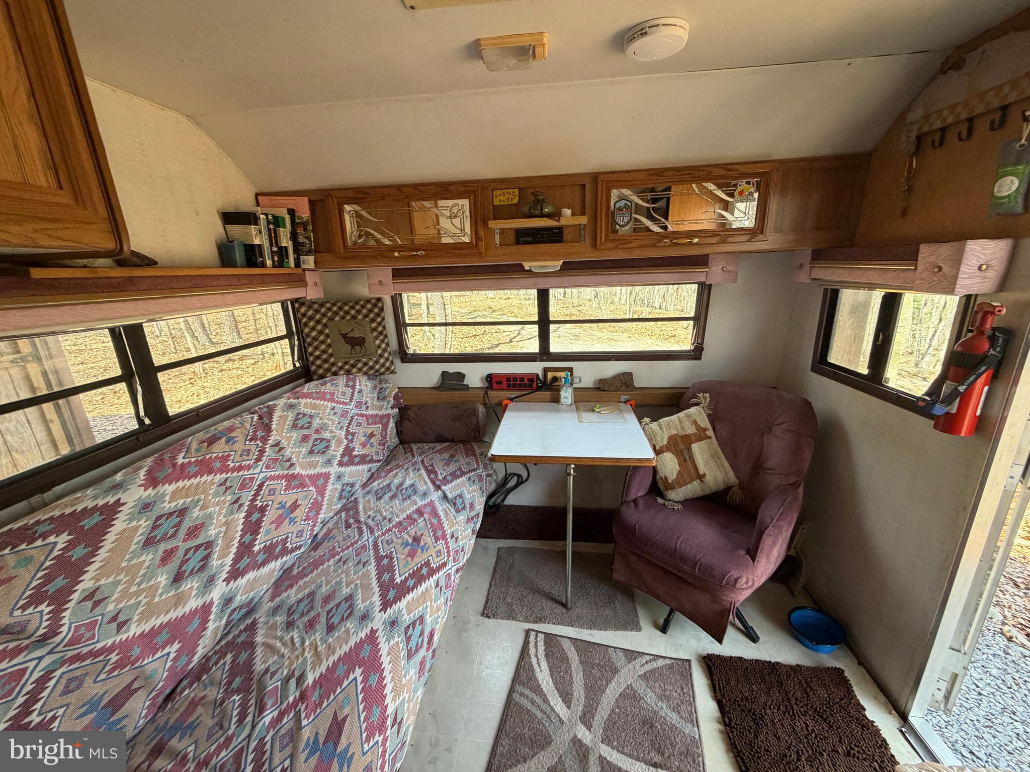 217 Trapper Lane Augusta, WV 26704 - Photo 39 of 111 a outdoor living room with furniture and a rug