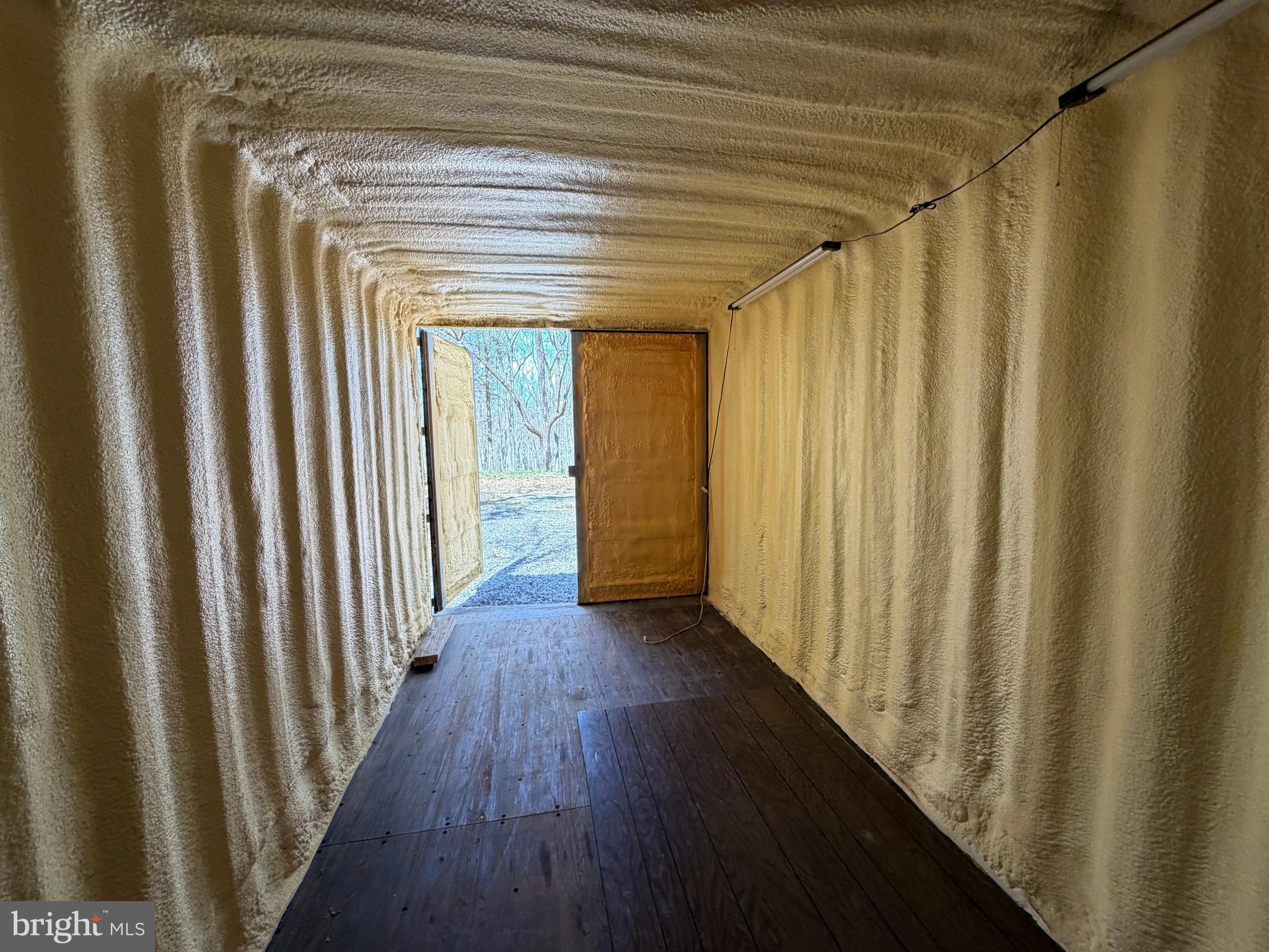 217 Trapper Lane Augusta, WV 26704 - Photo 46 of 111 a view of a hallway with wooden floor