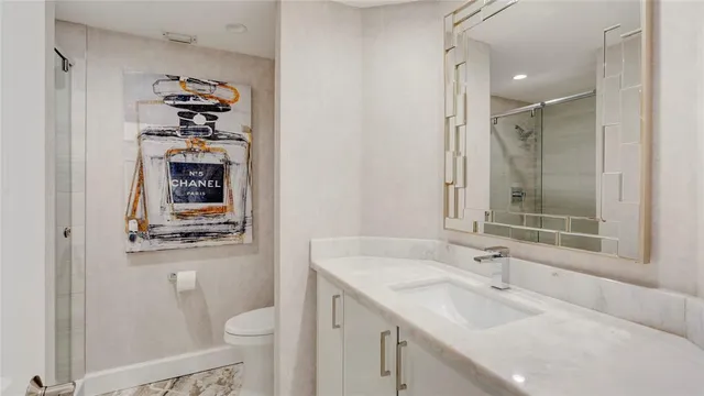 a very nice looking room with lots of tables a large window and furniture