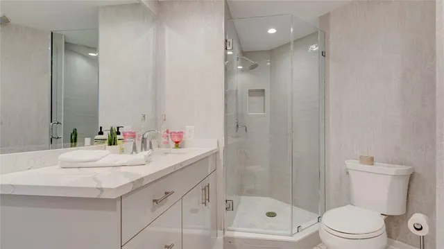 a view of swimming pool from a lake view