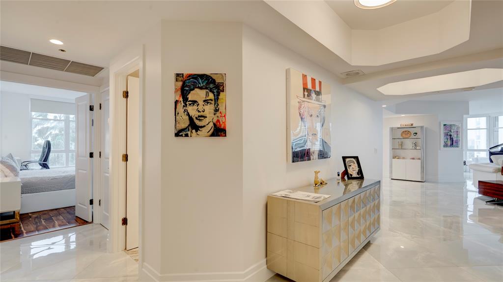 1440 South Ocean Boulevard, Unit 5C Pompano Beach, FL 33062 - Photo 5 of 71 a bathroom with a tub sink and mirror