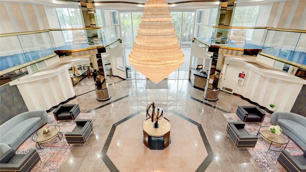 1440 South Ocean Boulevard, Unit 5C Pompano Beach, FL 33062 - Photo 56 of 71 a room with gym equipment