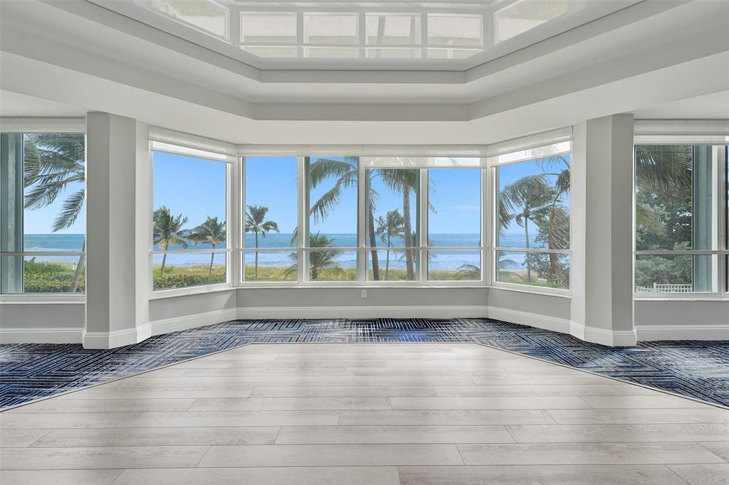 1440 South Ocean Boulevard, Unit 5C Pompano Beach, FL 33062 - Photo 60 of 71 a view of empty room with wooden floor and fan