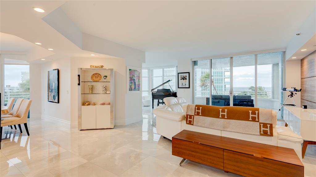 1440 South Ocean Boulevard, Unit 5C Pompano Beach, FL 33062 - Photo 6 of 71 a living room with furniture and a large window