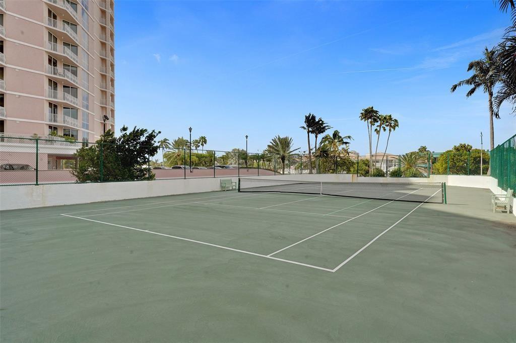 1440 South Ocean Boulevard, Unit 5C Pompano Beach, FL 33062 - Photo 69 of 71 a view of a tennis court