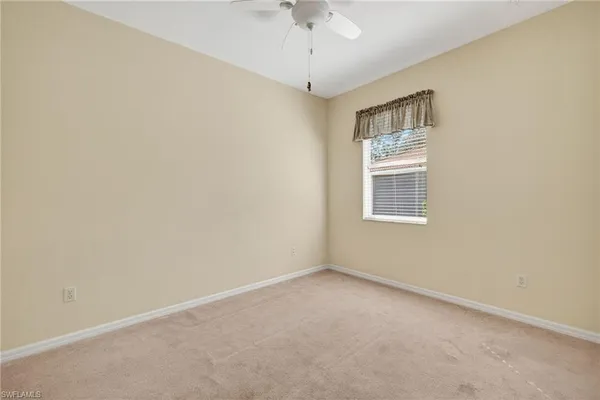 a view of a hallway with dining room