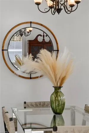 a view of a vase of flowers sitting on a table