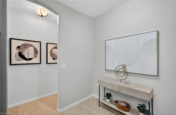 a vase of flowers sitting on a table