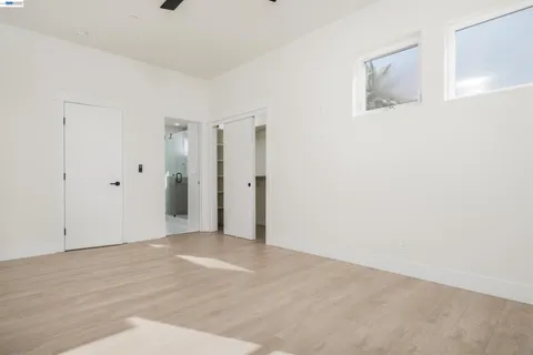 a bedroom with a bed and furniture