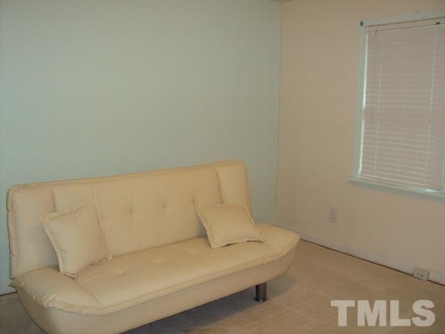 3506 Planet Drive Raleigh, NC 27604 - Photo 14 of 14 a living room with a couch
