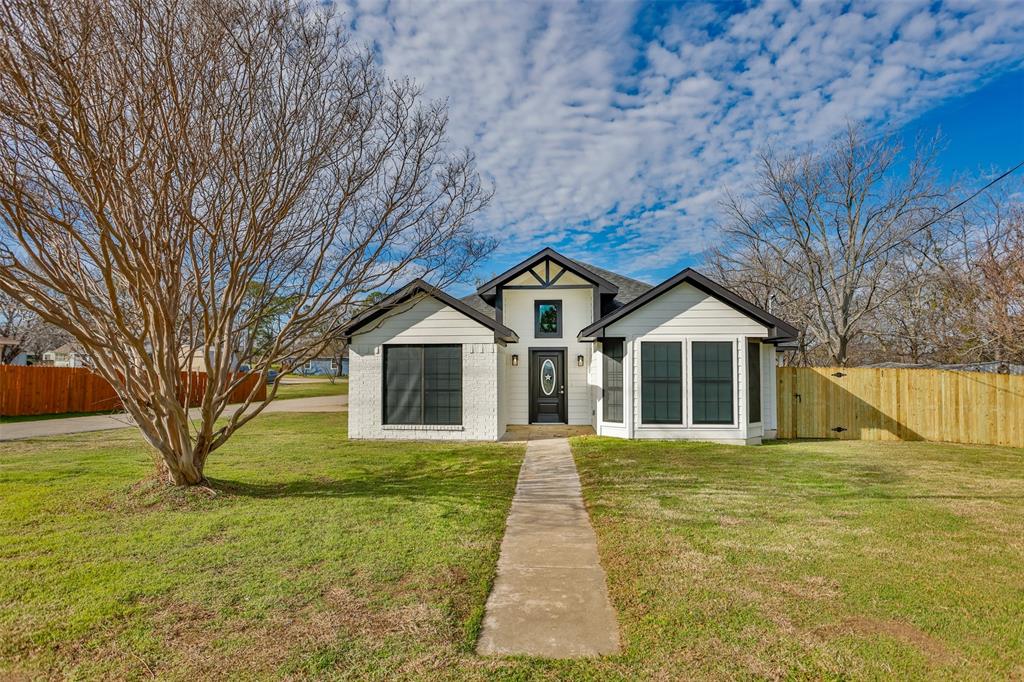 800 North Prairie Street Pilot Point, TX 76258 - Photo 1 of 1 Stunning newly remodeled home featuring a front yard