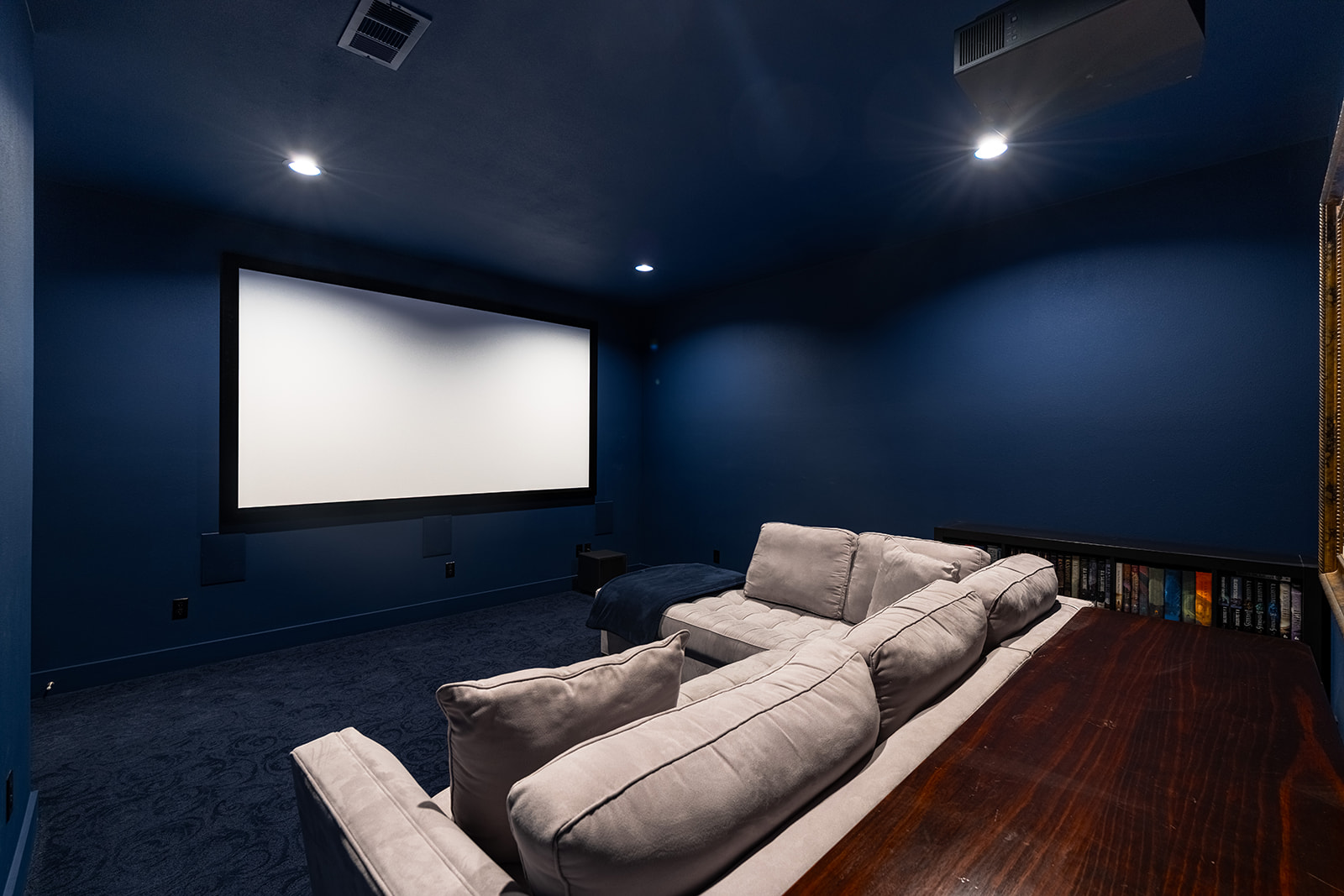 477 Willow Moon Ranch Road Crawford, TX 76638 - Photo 23 of 40 a projector room with furniture and a projector screen
